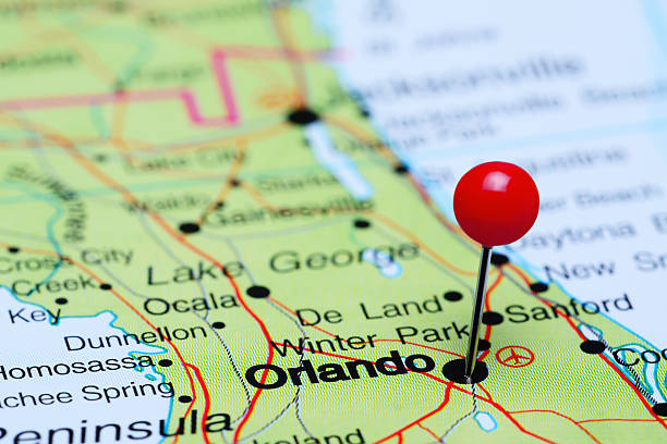 Photo of pinned Orlando on a map of USA. Passport appointment Orlando.