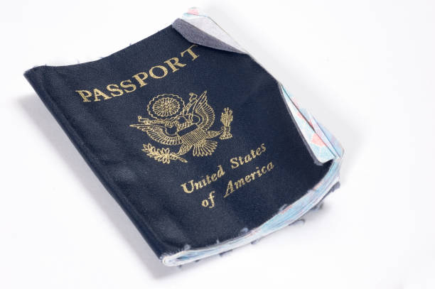 A Worn Out and Damaged US passport \ can you travel with a damaged passport cover/