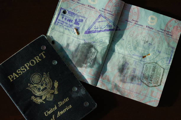 water damaged passport\\ Seattle, USA -Oct 10, 2007: A damaged water soaked United States Passport